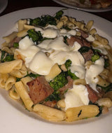 Cavatelli Pasta with Broccoli Rabe, Sausage and melted mozzarella