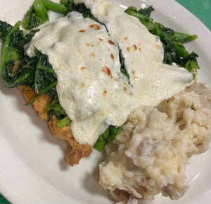 Fried Pork Cutlet topped with Brocolli Rabe and Melted Mozzarella with a side of Mashed Potatoes