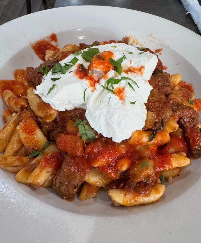 Cavatelli with a Braised Beef Ragu topped with a scoop of ricotta