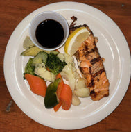 Grilled Salmon with balsamic glaze an Served with a vegetable medley and a choice of potato or rice.