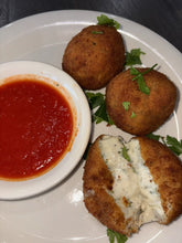 Jimmy Max Three Homemade Rice Balls with a side of marinara sauce